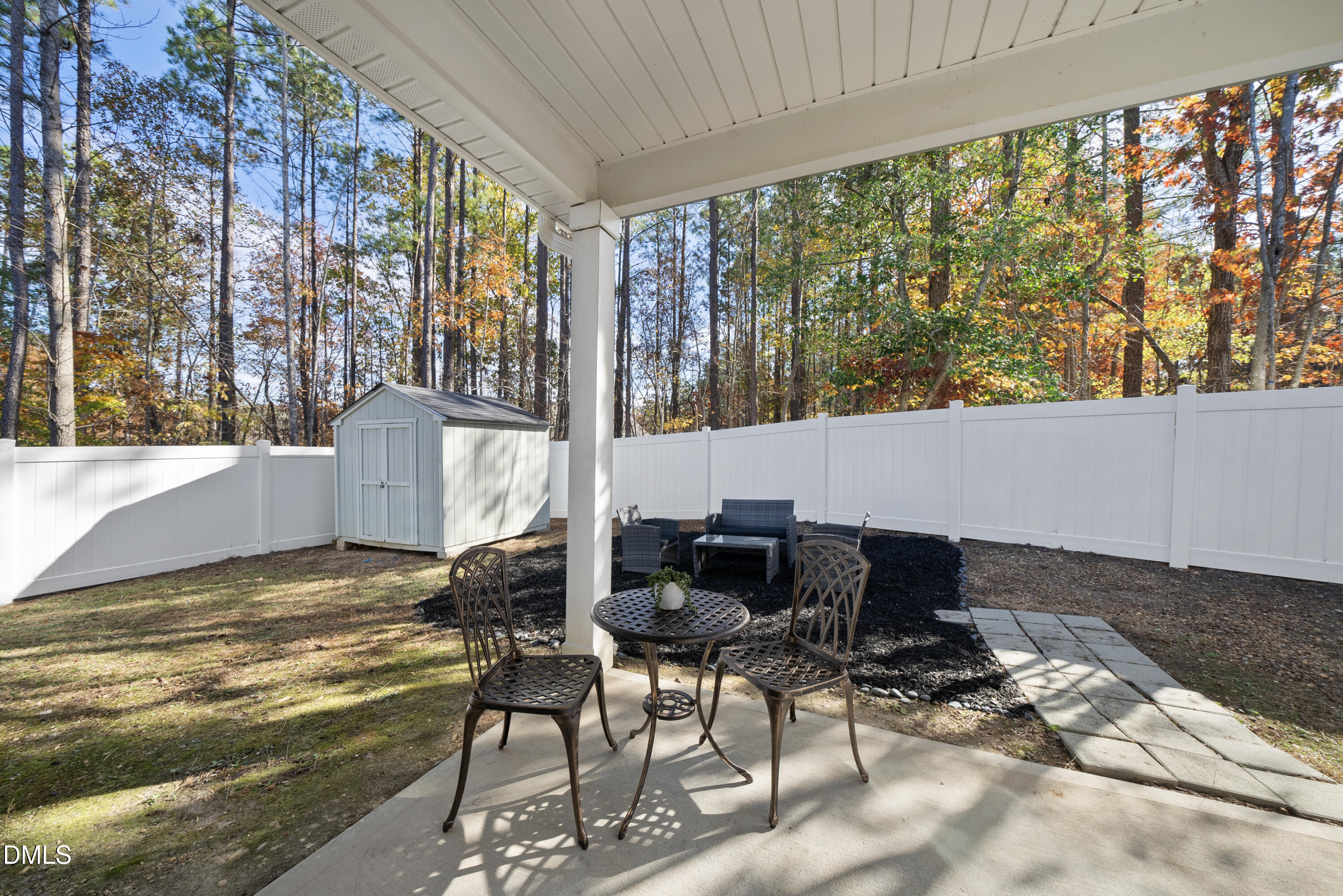 306 Springhill Lane Garner, NC 27529 - Photo 37 of 43 a room with furniture and a large window