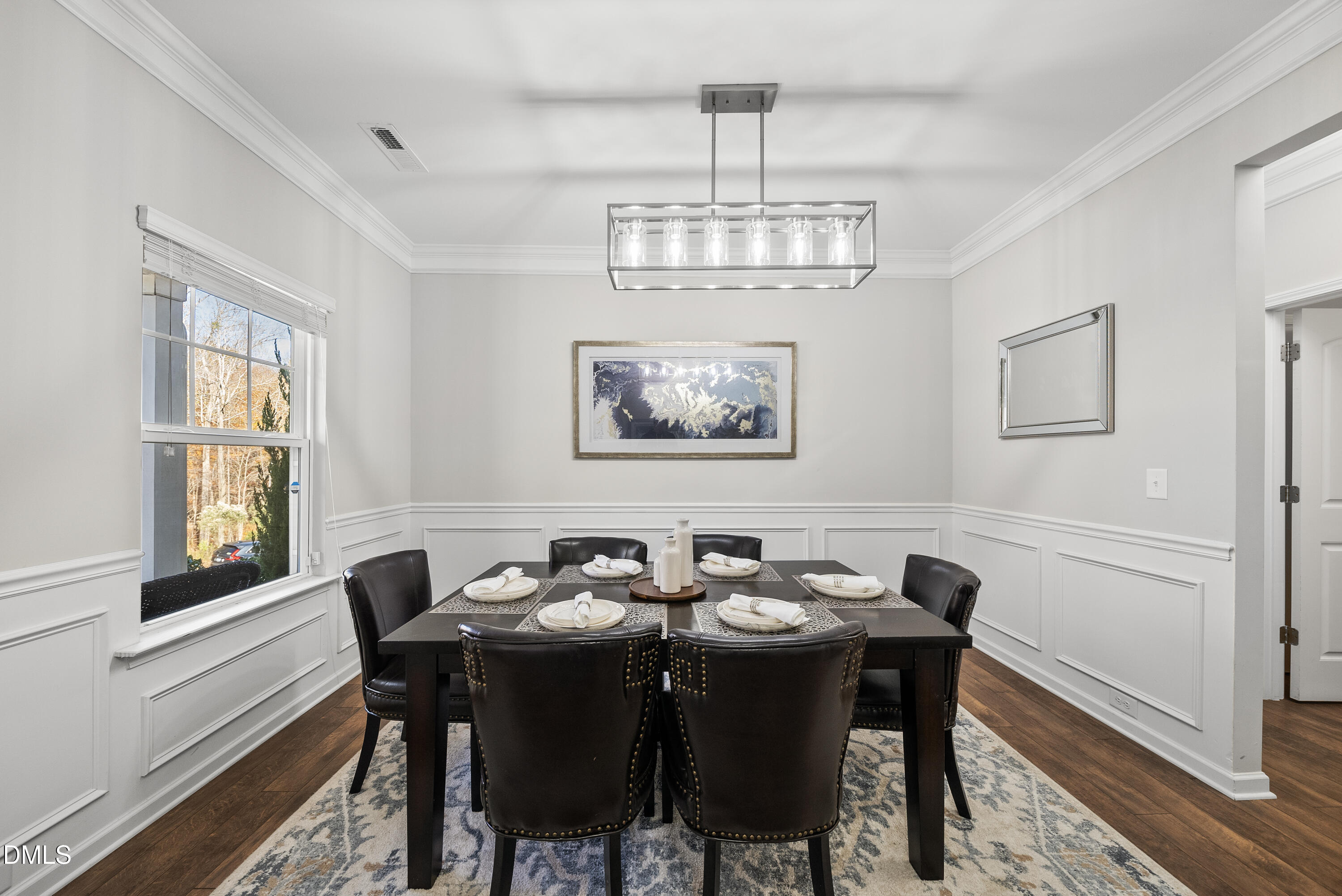 306 Springhill Lane Garner, NC 27529 - Photo 7 of 43 a view of a dining room with furniture window and outside view
