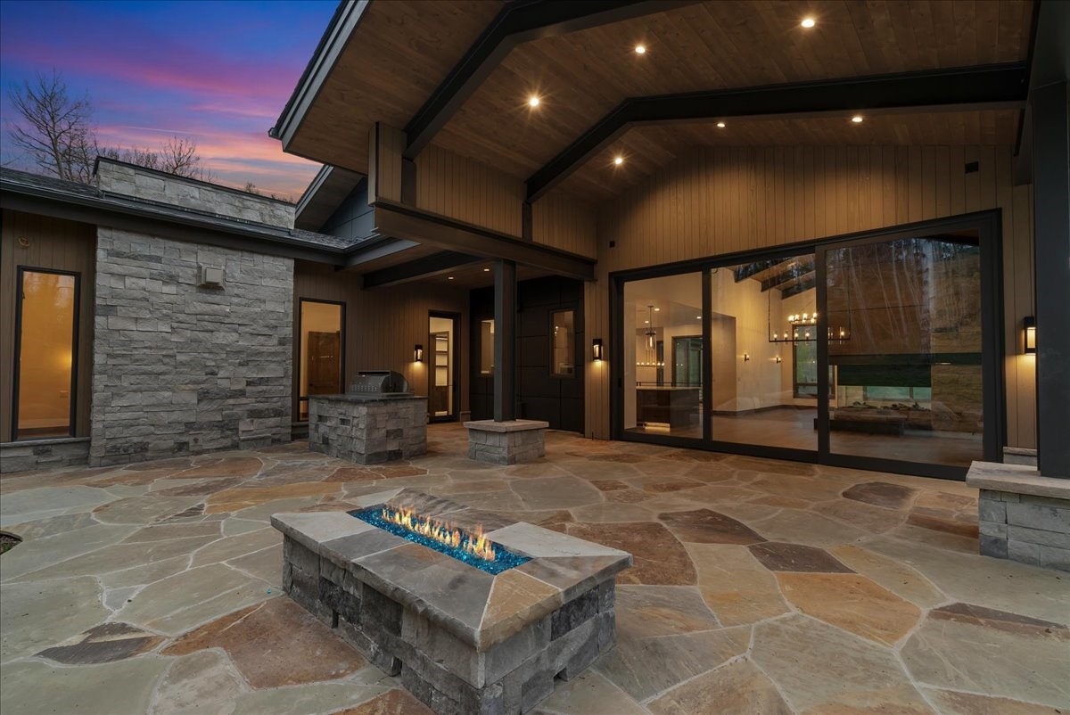 1615 Golden Eagle Road Silverthorne, CO 80498 - Photo 4 of 47 a view of a porch with a table and chairs