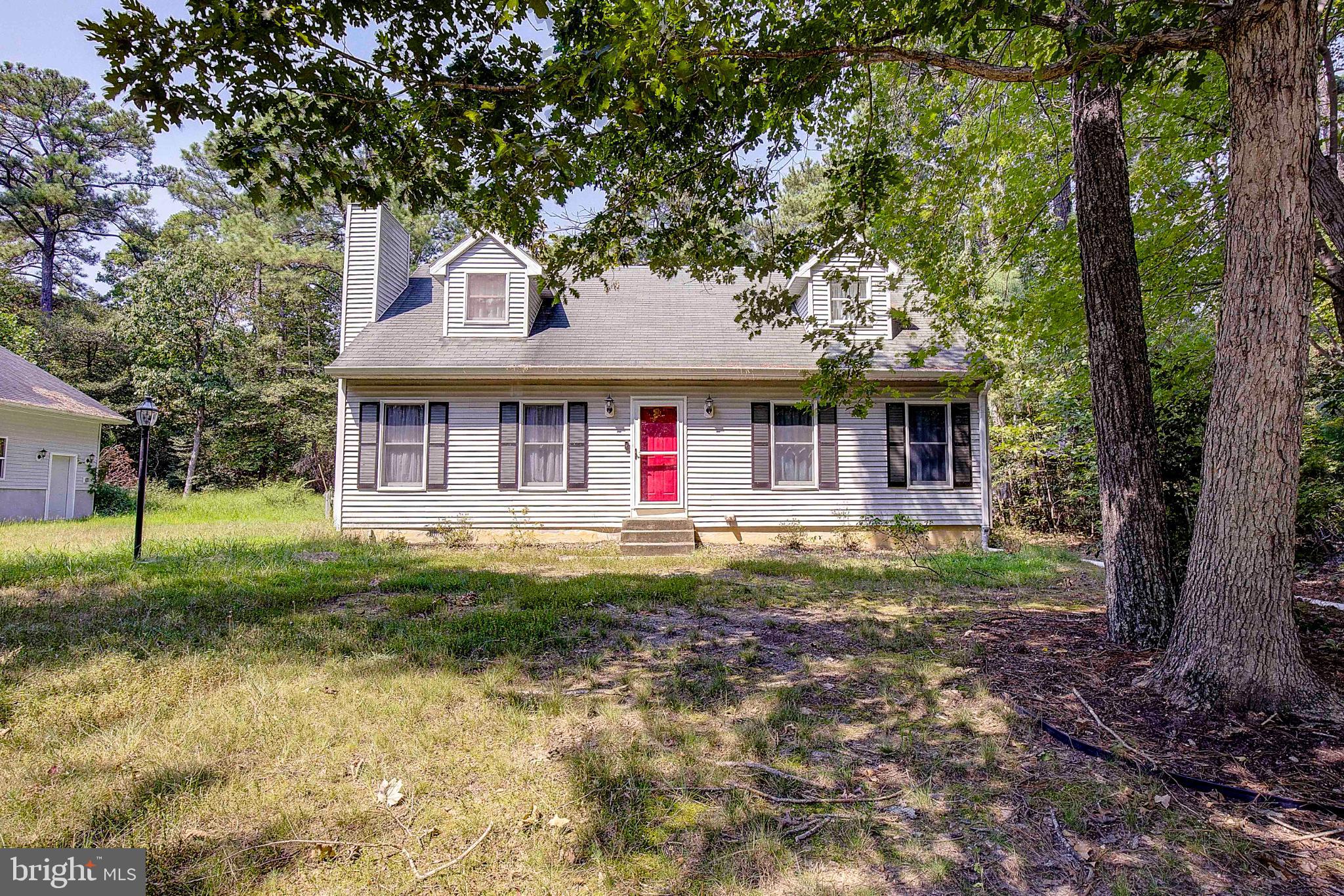 49220 Demko Road Lexington Park, MD 20653 - Photo 2 of 48 a front view of a house with garden