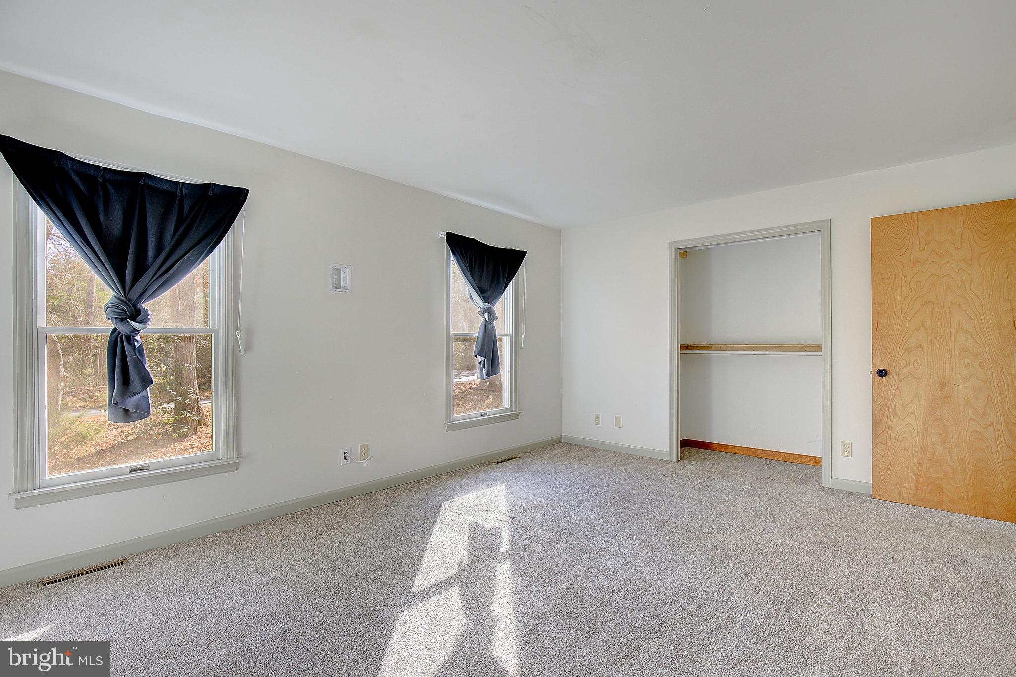 49220 Demko Road Lexington Park, MD 20653 - Photo 26 of 48 an empty room with windows and closet
