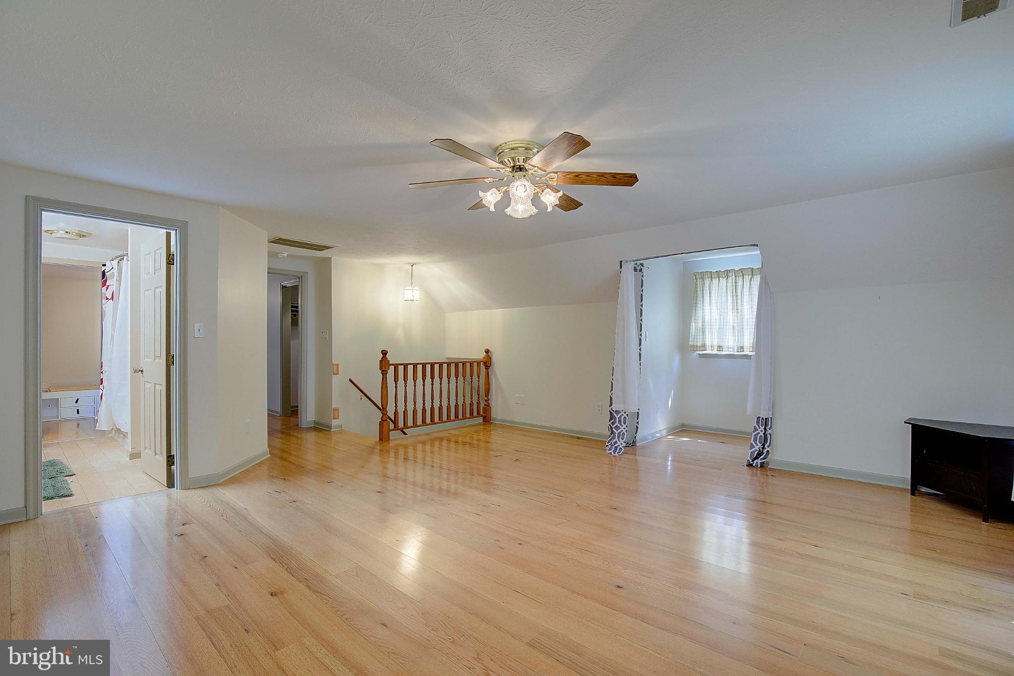 49220 Demko Road Lexington Park, MD 20653 - Photo 30 of 48 a view of an empty room with window and wooden floor
