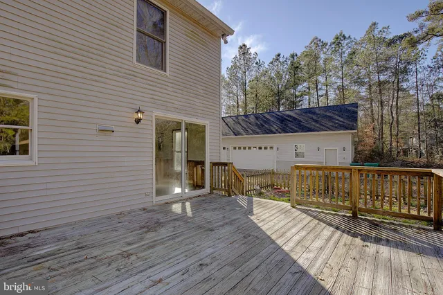 a view of balcony with wooden floor