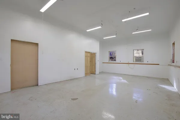 a view of a livingroom with natural light
