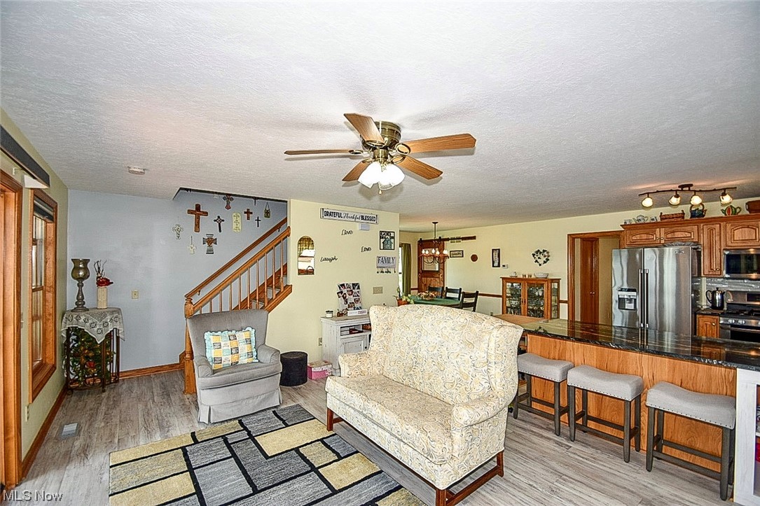 2332 Canfield Road Akron, OH 44312 - Photo 5 of 33 Living room, leads to second floor.