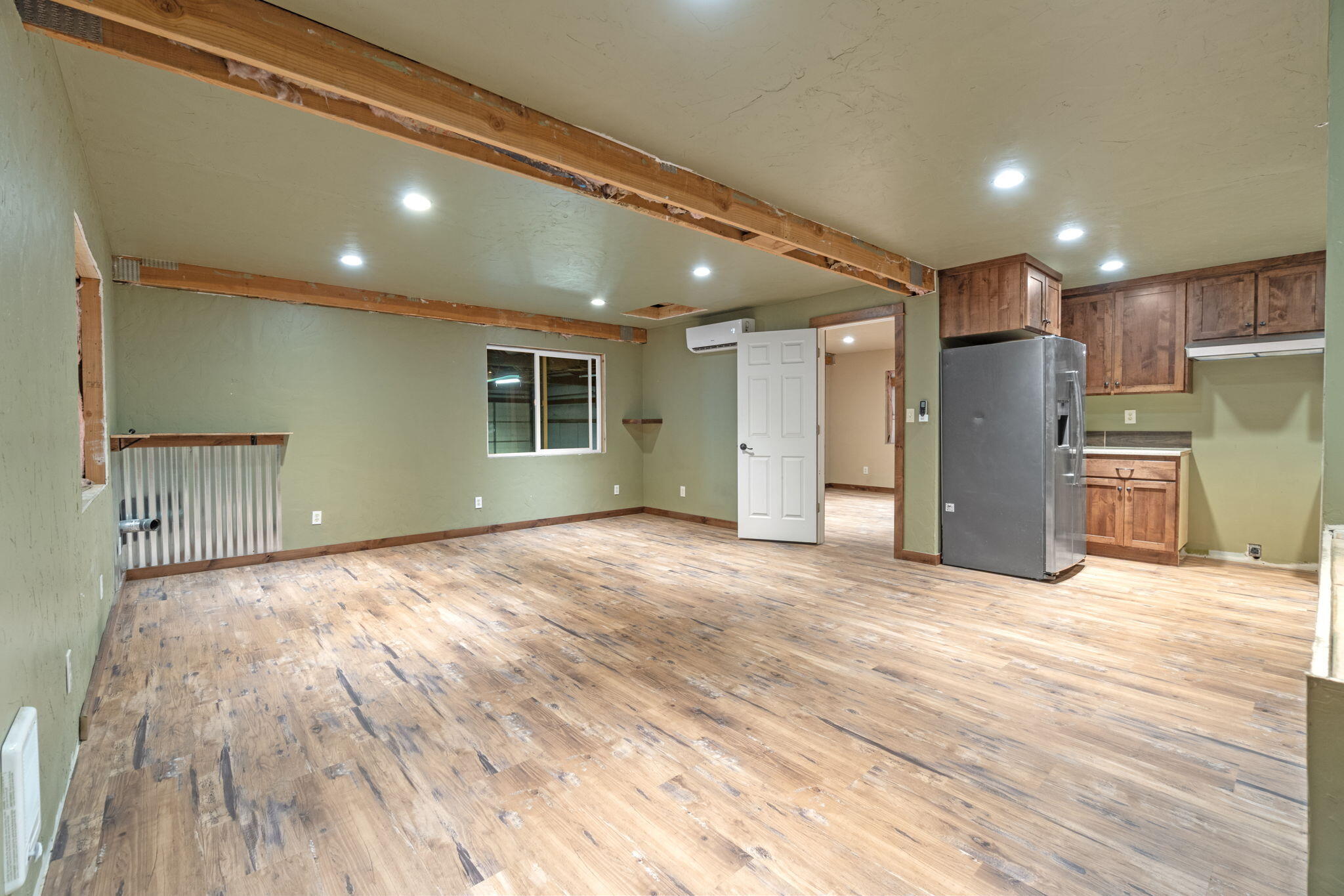 2630 Frontage Road Klamath Falls, OR 97601 - Photo 65 of 72 a view of an empty room with wooden floor and a window