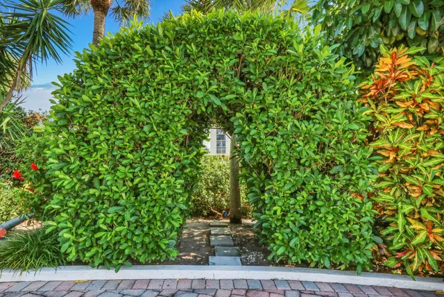 a view of sign board with buildings