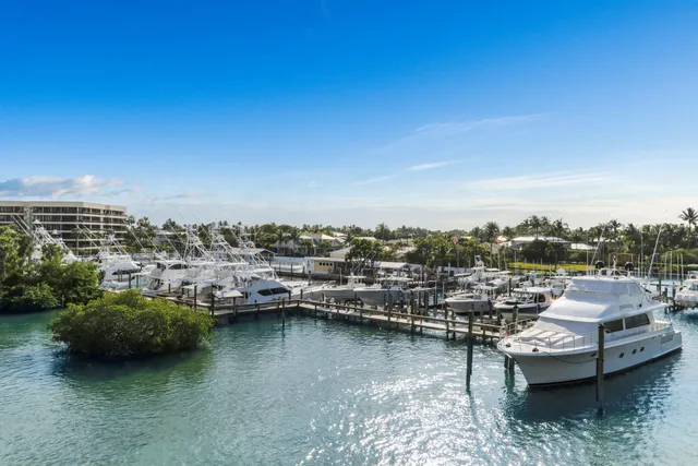 a view of a ocean with tall building in the background