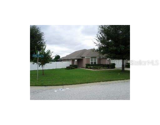 209 Silverton Road Davenport, FL 33897 - Photo 1 of 1 Exterior Front - Huge corner lot with safe closed in back yard.