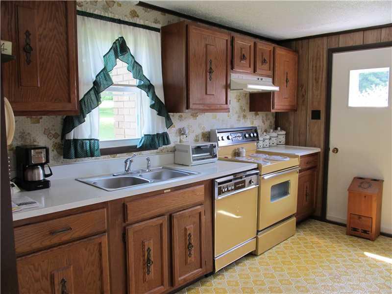 94 Lightcap Road Latrobe, PA 15650 - Photo 14 of 23 Kitchen. Lots of space to prepare dinners and door to side porch.