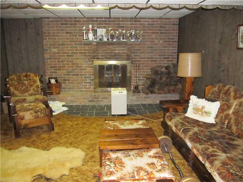 94 Lightcap Road Latrobe, PA 15650 - Photo 22 of 23 Family Room. Notice the beautiful brick fireplace.