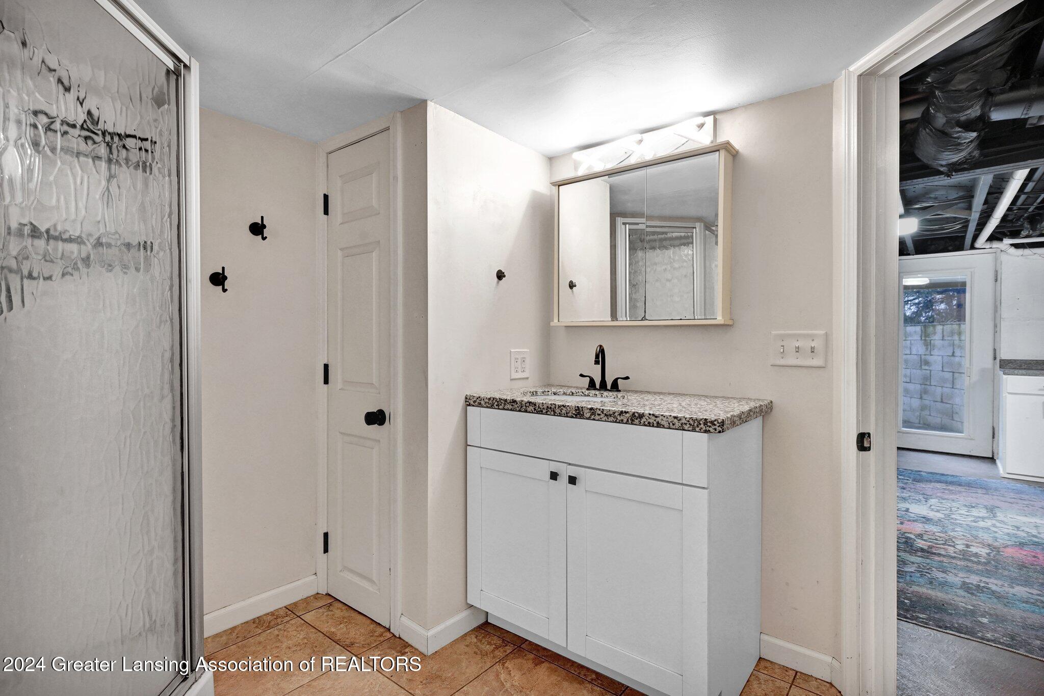 3518 Ruth Avenue Lansing, MI 48910 - Photo 28 of 38 12. Full bath, Basement level