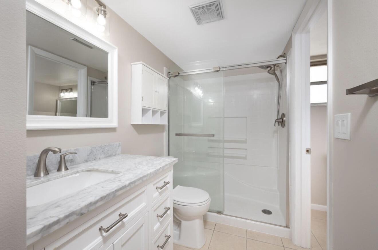 1943 Southwest Palm City Road, Unit I Stuart, FL 34994 - Photo 8 of 19 Primary Bath