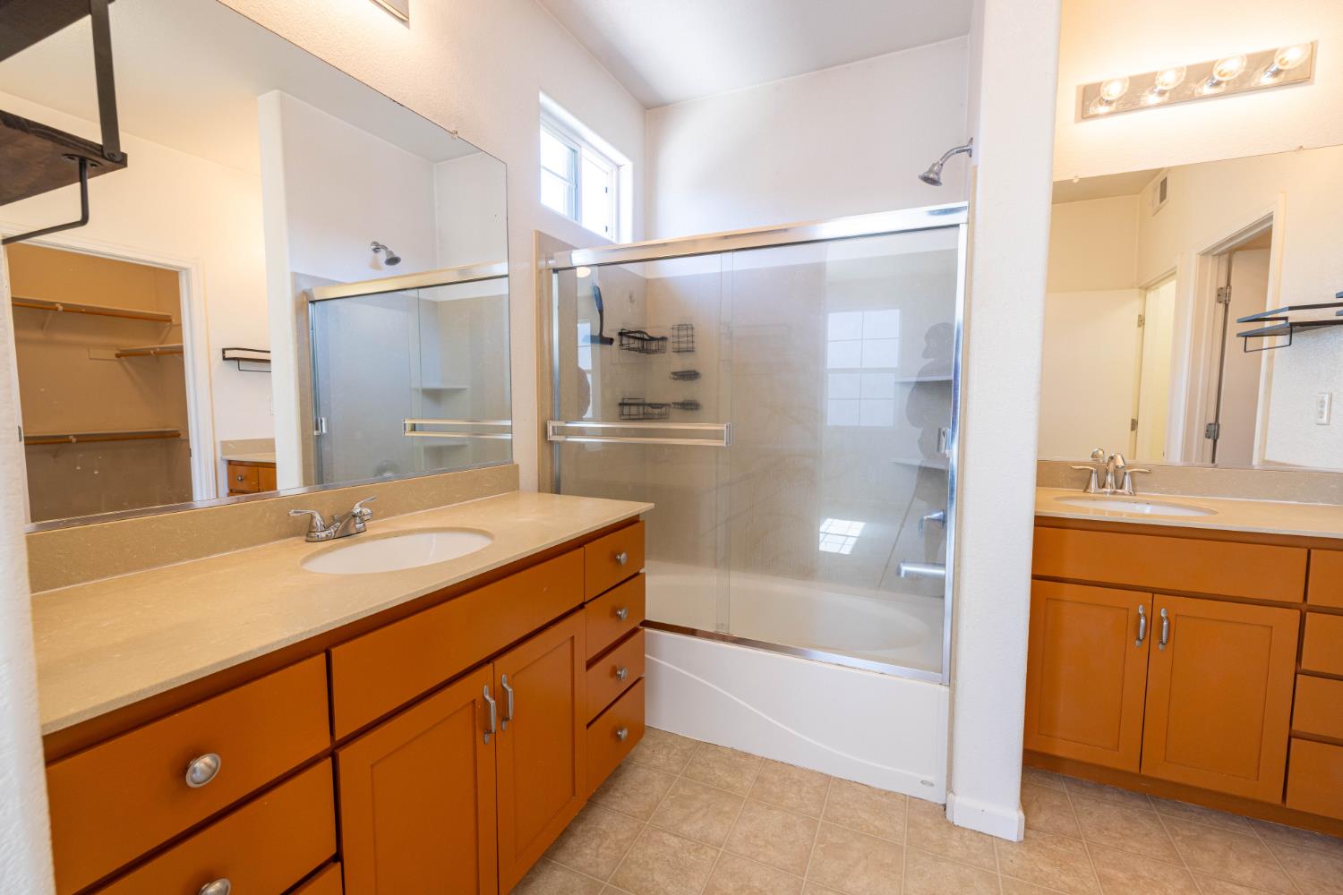 3122 Lea Sterling Way Rancho Cordova, CA 95670 - Photo 15 of 31 a bathroom with a granite countertop sink mirror and a bathtub