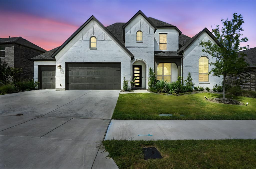 4621 Mount Vista Road Oak Point, TX 75068 - Photo 1 of 40 a front view of a house with a yard and garage