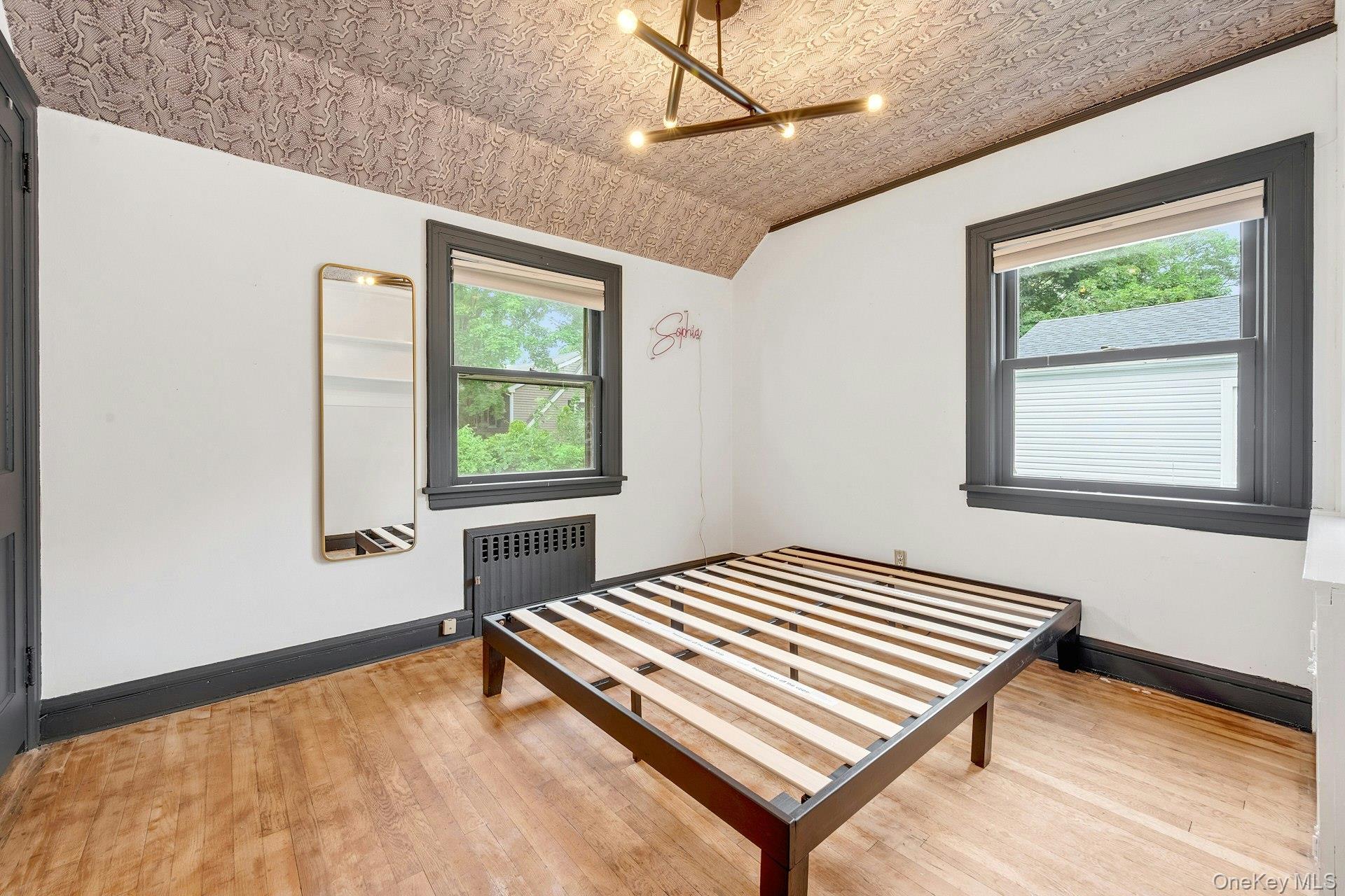 151 Clarence Road Scarsdale, NY 10583 - Photo 11 of 28 a bedroom with a bed and a window