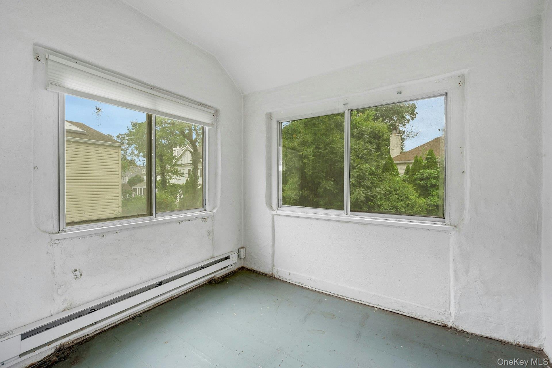 151 Clarence Road Scarsdale, NY 10583 - Photo 12 of 28 a view of an empty room with a window
