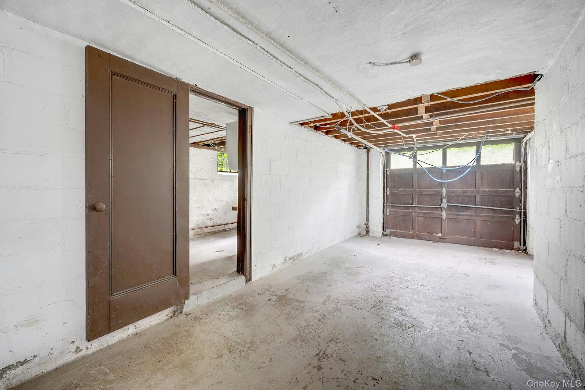 151 Clarence Road Scarsdale, NY 10583 - Photo 18 of 28 an empty room with windows