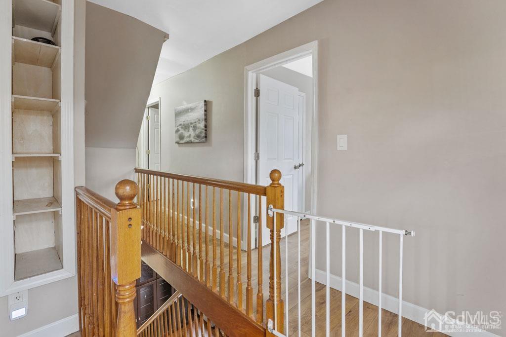 70 County Road Cliffwood, NJ 07721 - Photo 13 of 28 a view of staircase with railing and white walls