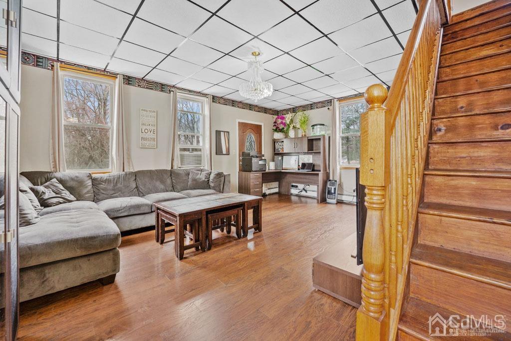 70 County Road Cliffwood, NJ 07721 - Photo 8 of 28 a living room with furniture and a rug