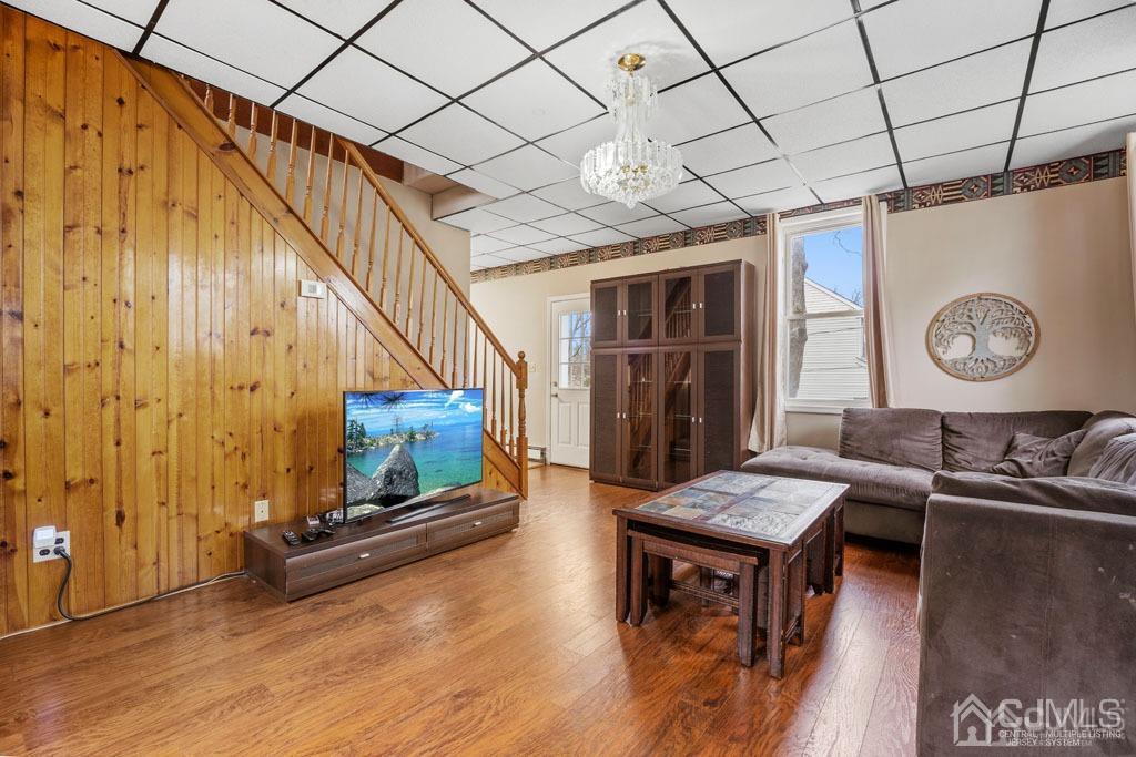 70 County Road Cliffwood, NJ 07721 - Photo 10 of 28 a living room with furniture and a wooden floor