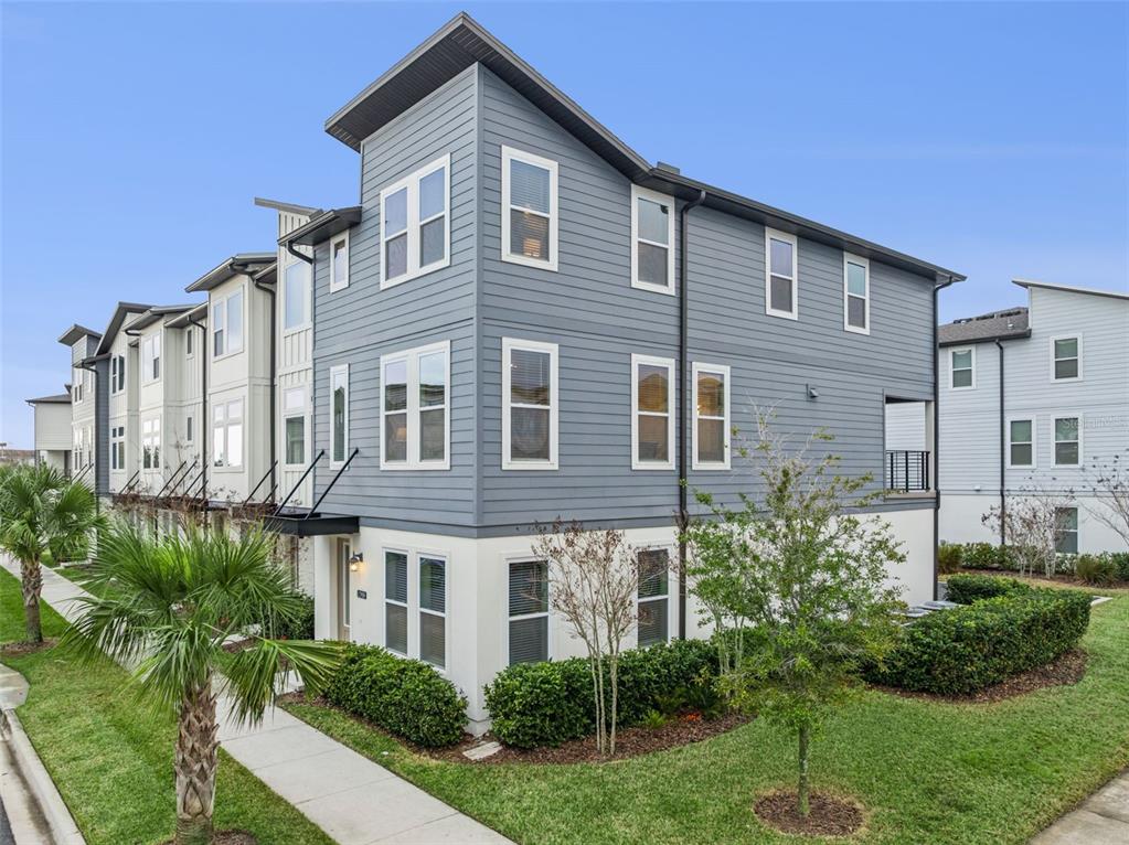 12908 Gabor Avenue Orlando, FL 32827 - Photo 3 of 77 a front view of a house with a yard