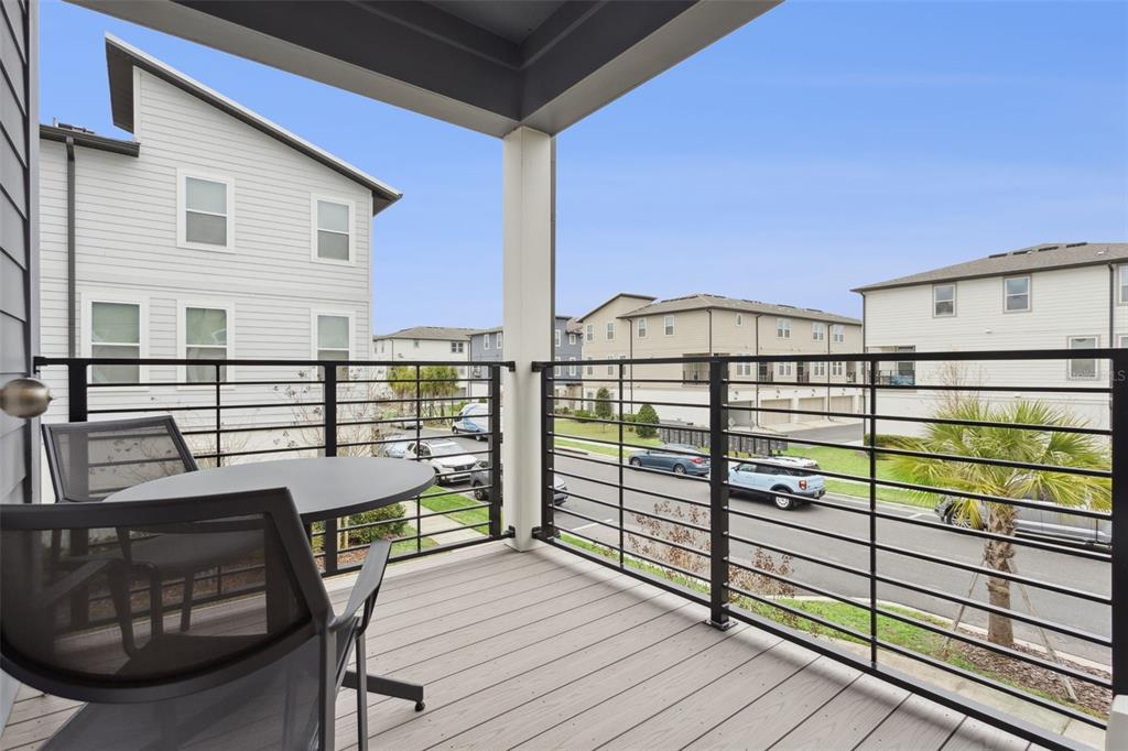 12908 Gabor Avenue Orlando, FL 32827 - Photo 31 of 77 a view of a balcony with wooden floor and iron fence