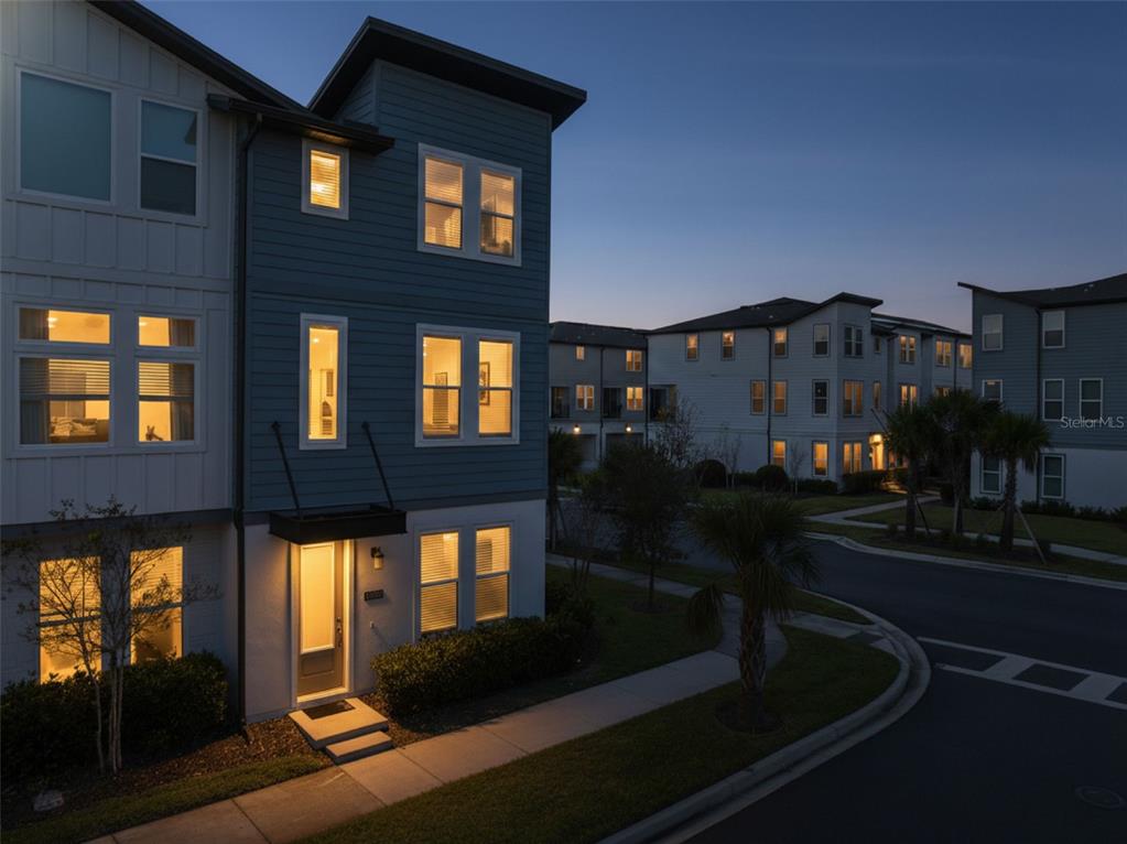 12908 Gabor Avenue Orlando, FL 32827 - Photo 6 of 77 a front view of a house with a yard