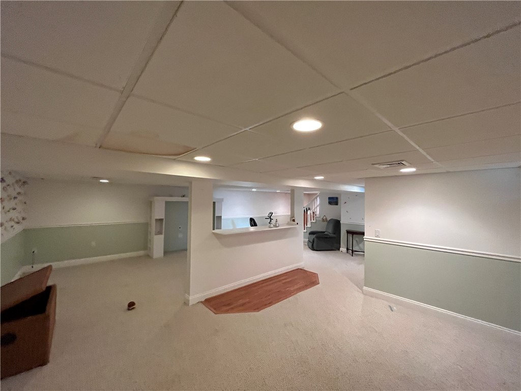 19 Del Rio Court Warwick, RI 02818 - Photo 12 of 21 Finished basement, media/ family room area.