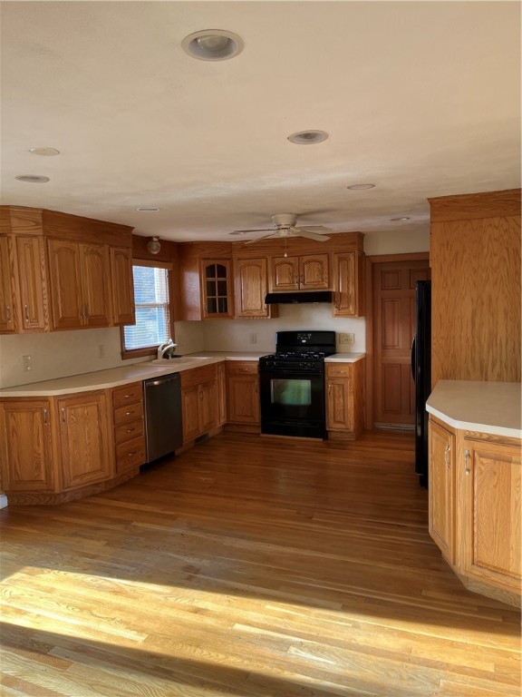 19 Del Rio Court Warwick, RI 02818 - Photo 3 of 21 Kitchen, view from eat -in area toward exit door to garage.