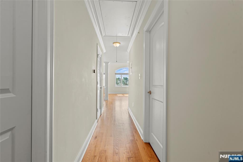 731 Stuyvesant Avenue, Unit 2 Lyndhurst, NJ 07071 - Photo 13 of 24 a view of a hallway with wooden floor and entryway