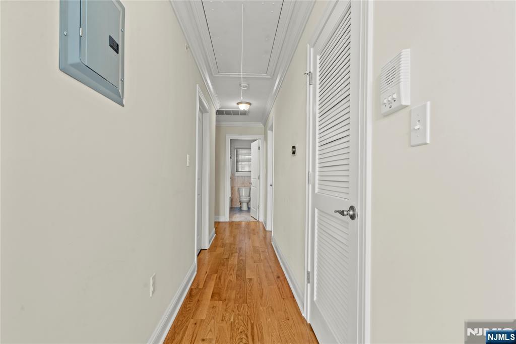 731 Stuyvesant Avenue, Unit 2 Lyndhurst, NJ 07071 - Photo 14 of 24 a view of a hallway with a white door