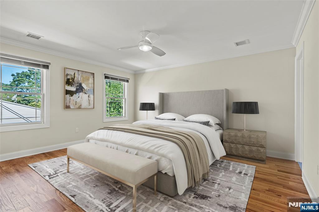 731 Stuyvesant Avenue, Unit 2 Lyndhurst, NJ 07071 - Photo 15 of 24 a bedroom with a large bed and a window