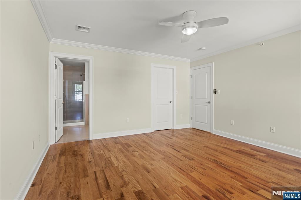 731 Stuyvesant Avenue, Unit 2 Lyndhurst, NJ 07071 - Photo 16 of 24 a view of empty room with wooden floor