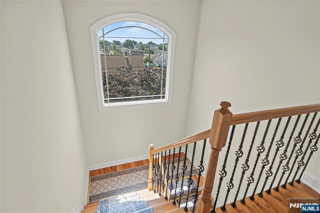 731 Stuyvesant Avenue, Unit 2 Lyndhurst, NJ 07071 - Photo 3 of 24 a view of staircase with rug floor