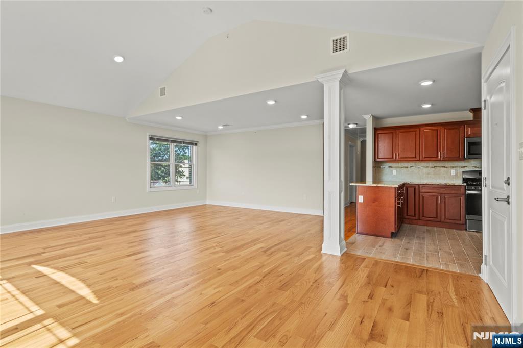 731 Stuyvesant Avenue, Unit 2 Lyndhurst, NJ 07071 - Photo 6 of 24 a view of a living room a flat screen tv