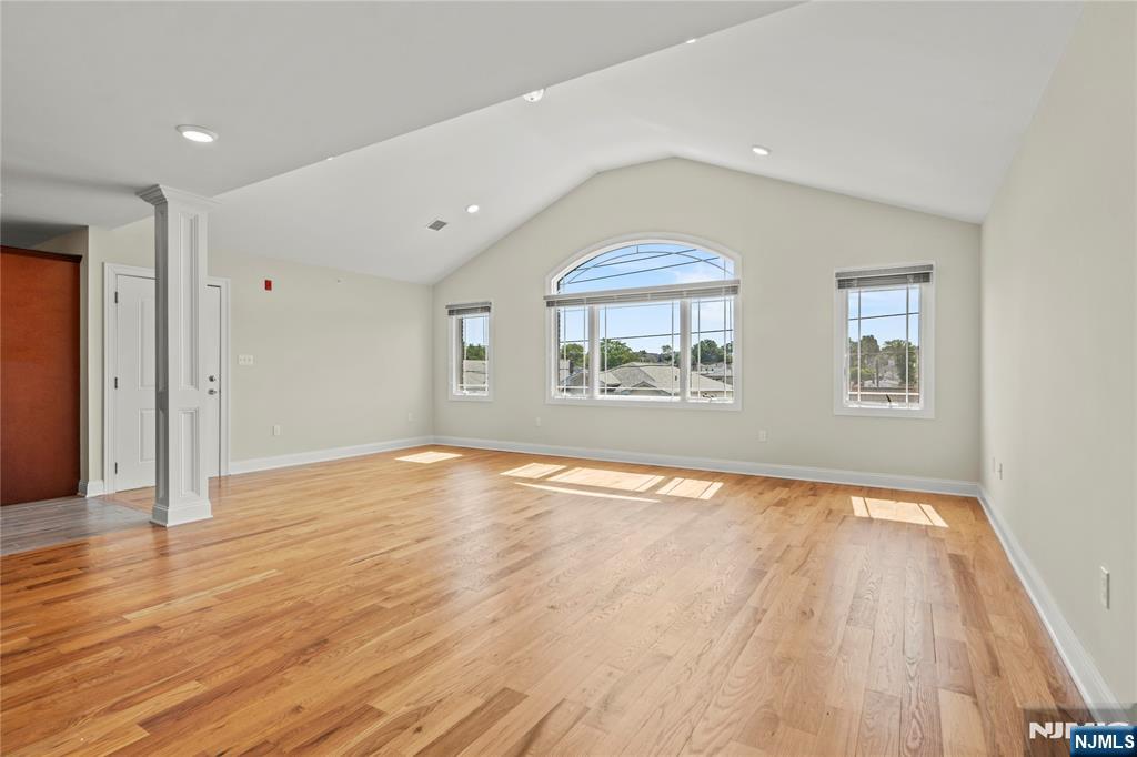 731 Stuyvesant Avenue, Unit 2 Lyndhurst, NJ 07071 - Photo 8 of 24 a view of empty room with wooden floor and fan