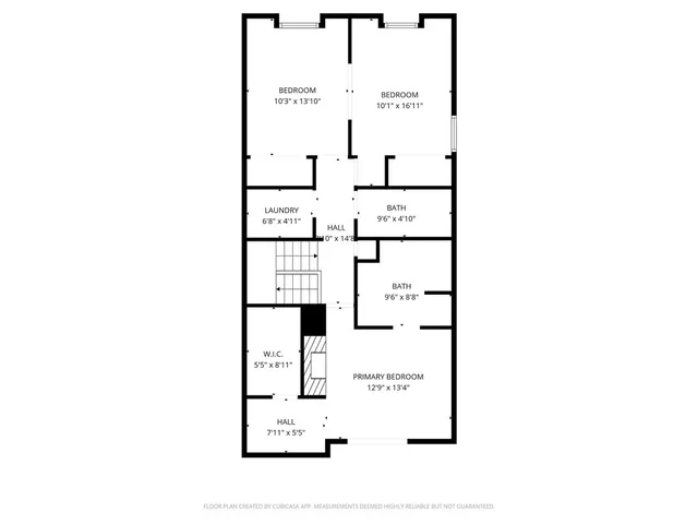 a picture of a bench in front of a wall