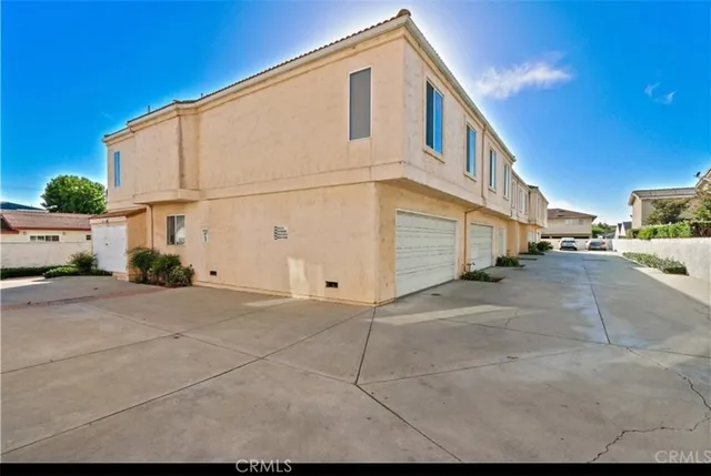 a view of a street with buildings