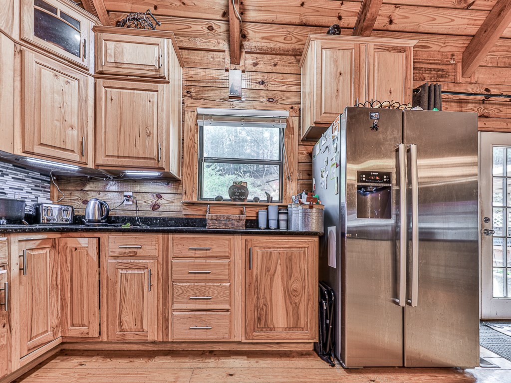 290 Ruby Lane Ellijay, GA 30540 - Photo 14 of 34 a kitchen with stainless steel appliances granite countertop a refrigerator and a stove
