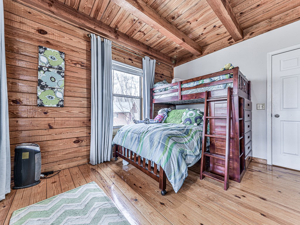 290 Ruby Lane Ellijay, GA 30540 - Photo 24 of 34 a bedroom with a bed and a dresser