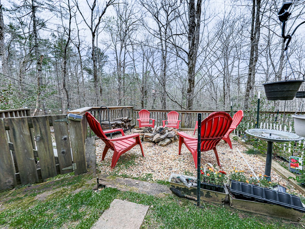 290 Ruby Lane Ellijay, GA 30540 - Photo 27 of 34 a view of outdoor space with seating area and trees