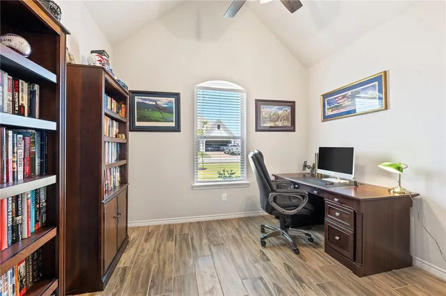 a workspace with a bookshelf