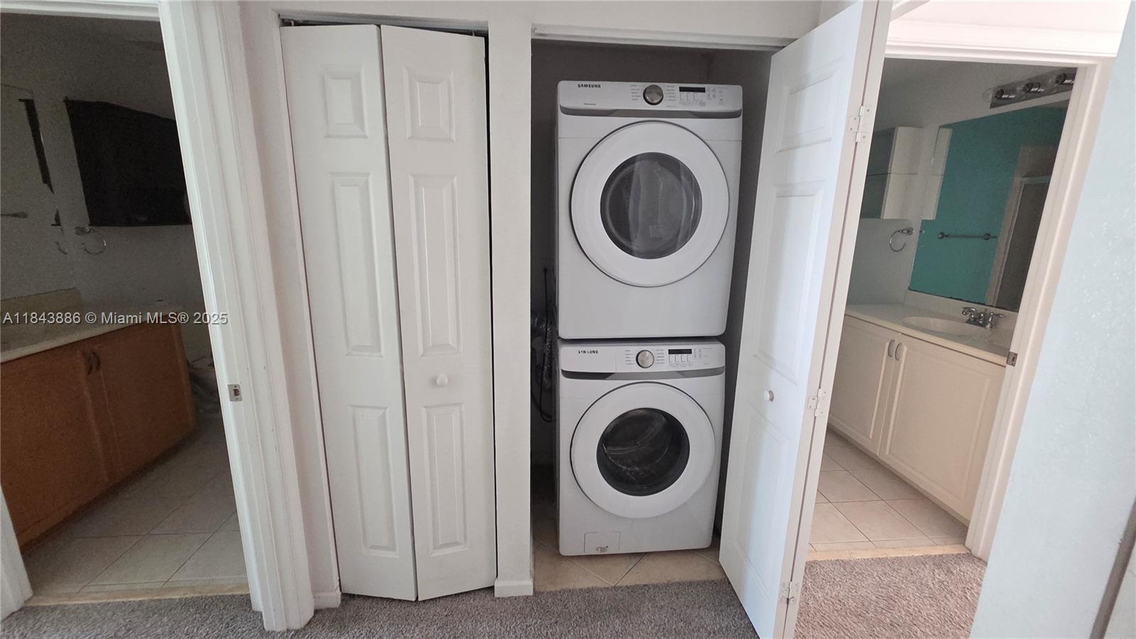 4605 Southwest 75th Way, Unit 4605 Davie, FL 33314 - Photo 21 of 42 a utility room with dryer and washer