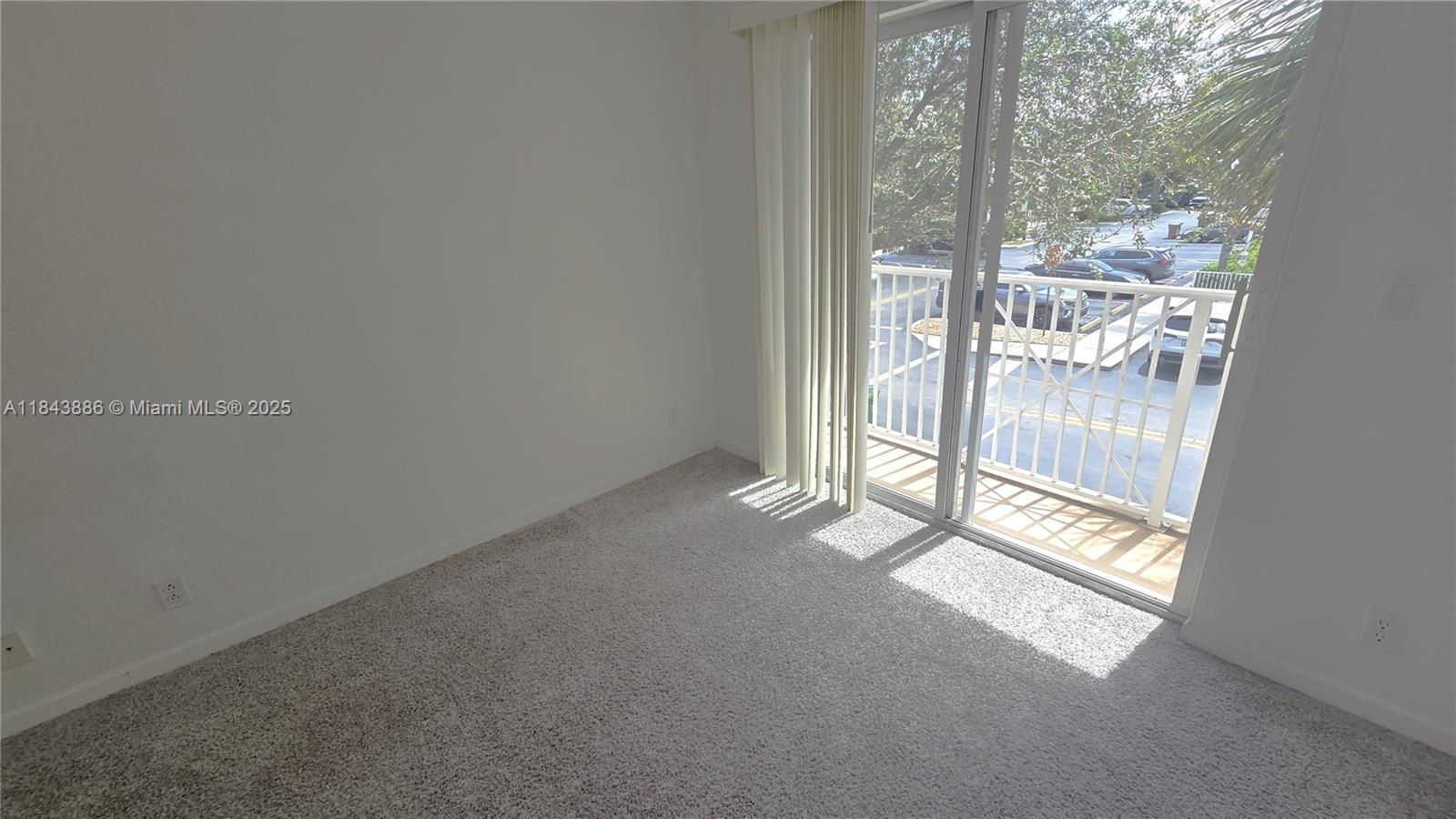 4605 Southwest 75th Way, Unit 4605 Davie, FL 33314 - Photo 33 of 42 a view of empty room with wooden floor and fan