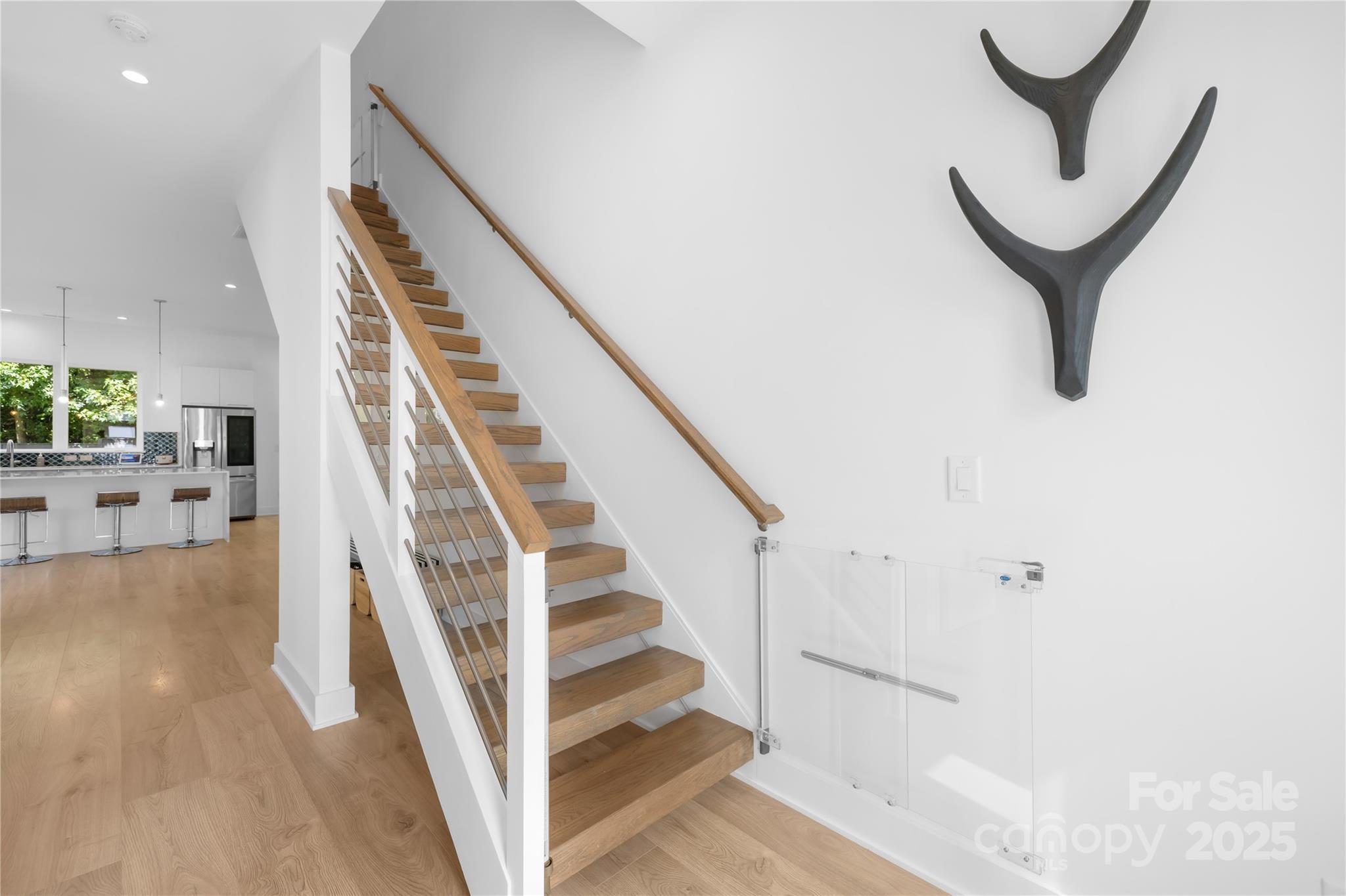 1627 Rama Road Charlotte, NC 28211 - Photo 11 of 43 a view of entryway and hall with wooden floor