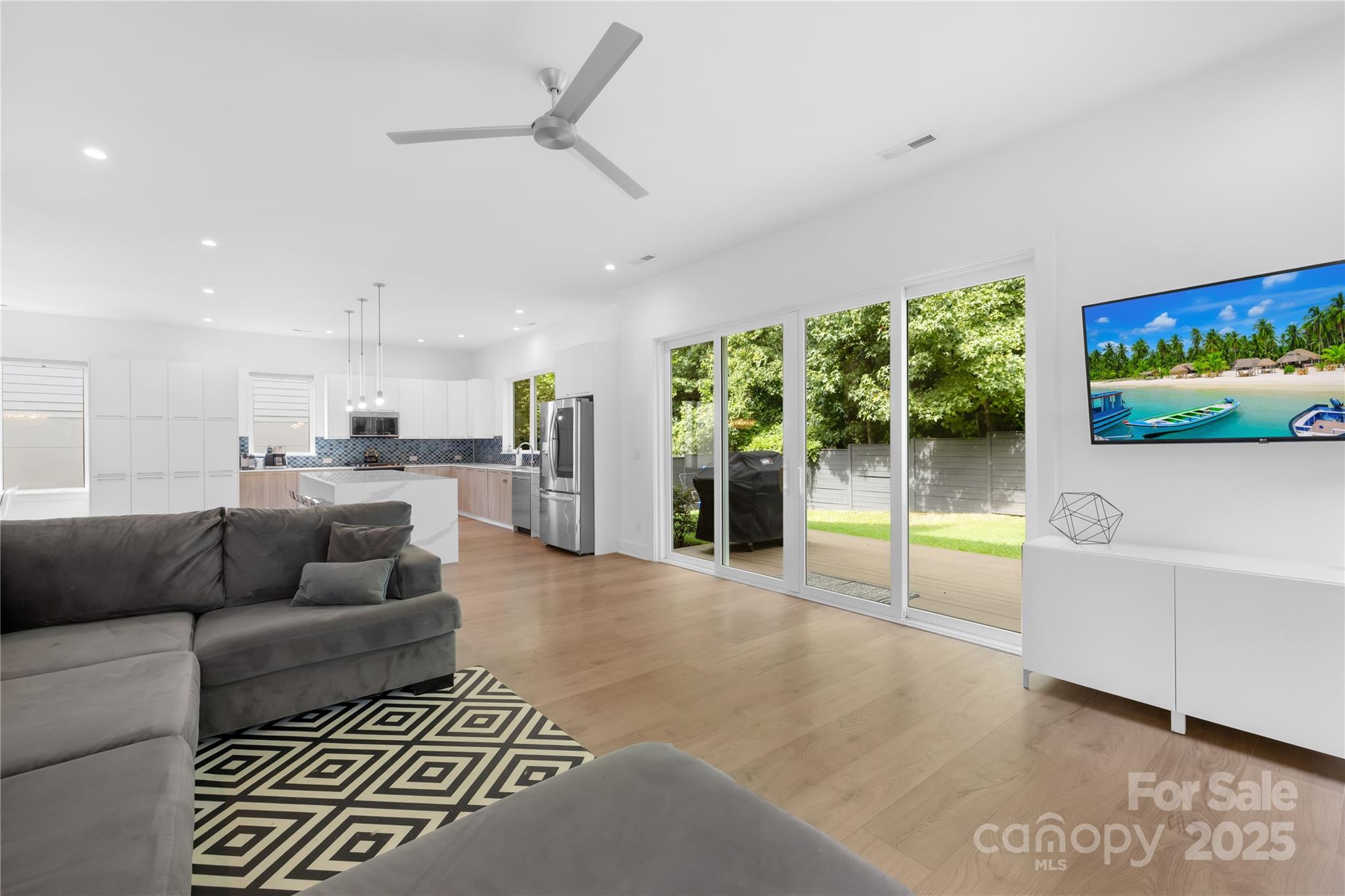 1627 Rama Road Charlotte, NC 28211 - Photo 21 of 43 a living room with furniture and a flat screen tv