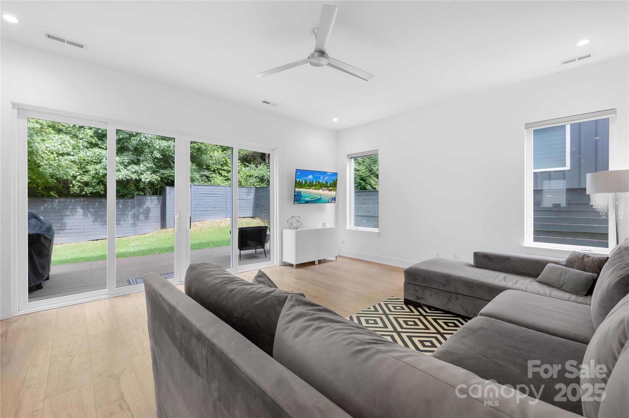 1627 Rama Road Charlotte, NC 28211 - Photo 24 of 43 a living room with furniture and a large window