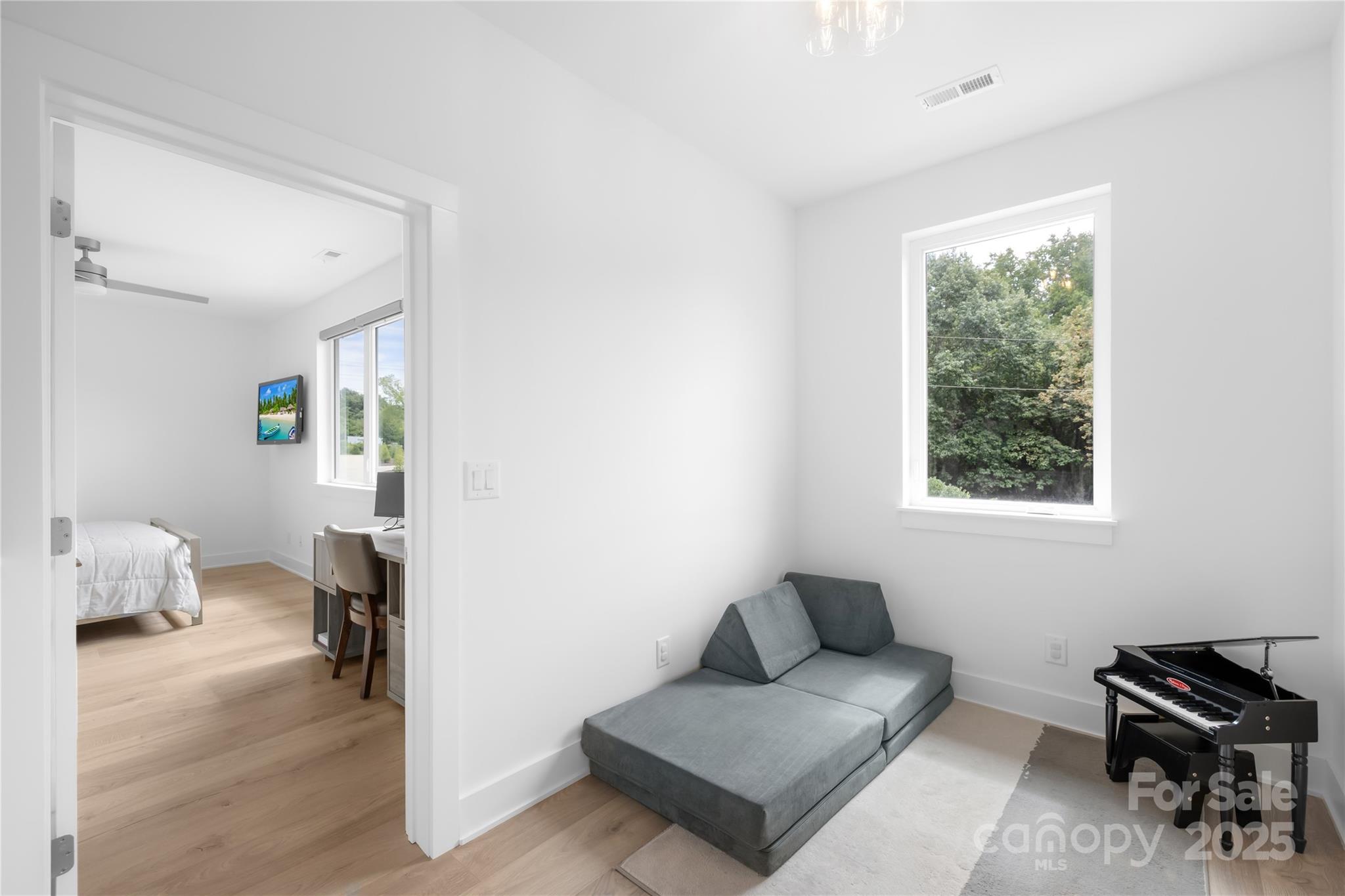 1627 Rama Road Charlotte, NC 28211 - Photo 28 of 43 a living room with furniture and a window