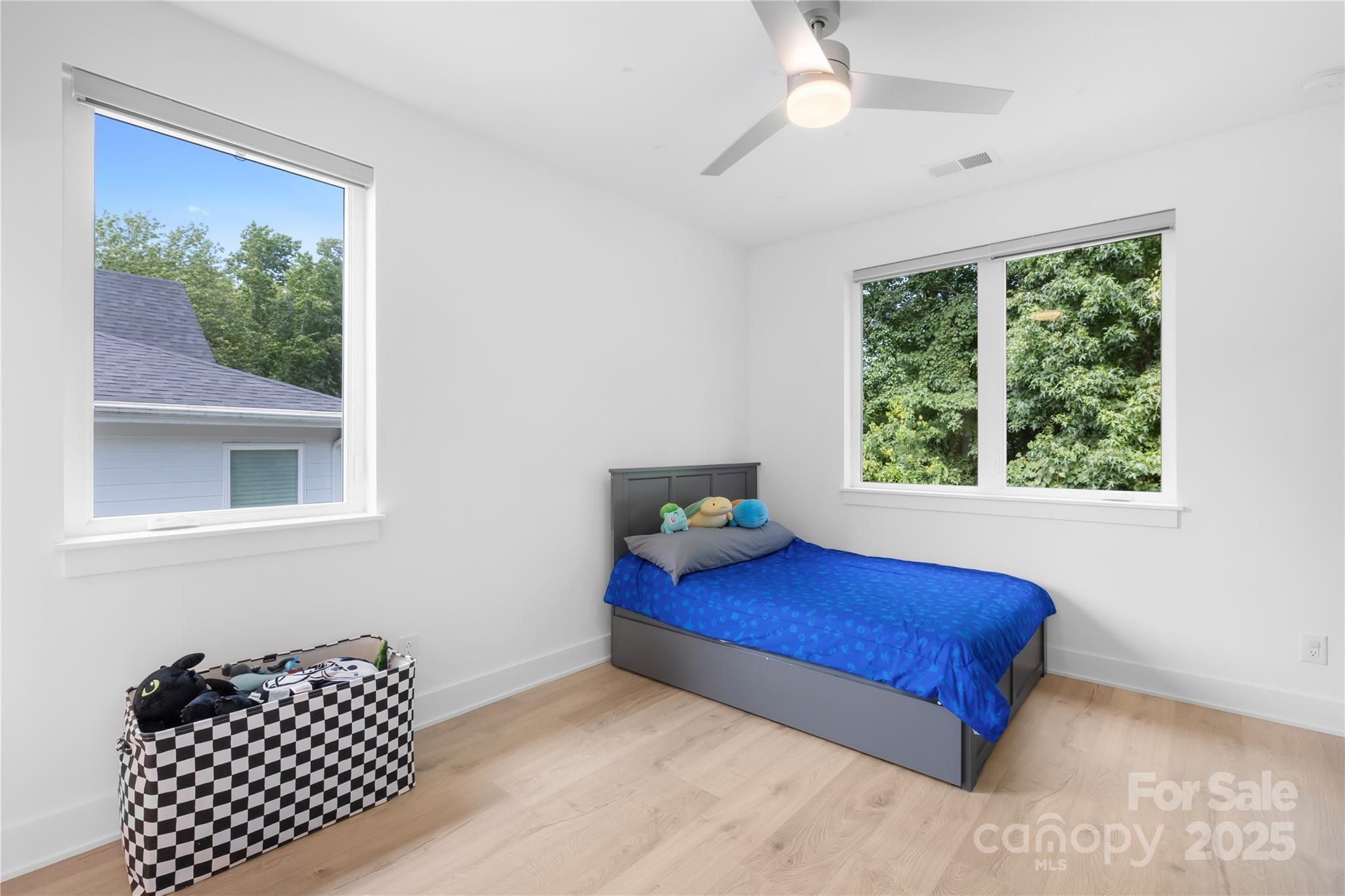 1627 Rama Road Charlotte, NC 28211 - Photo 33 of 43 a bedroom with a bed and a window